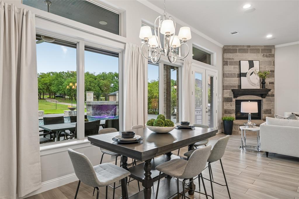 1657 Florence Road Keller, TX 76262 - Photo 12 of 40 a view of a dining room with furniture window and wooden floor