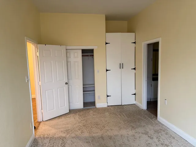 a view of a backyard with sitting area