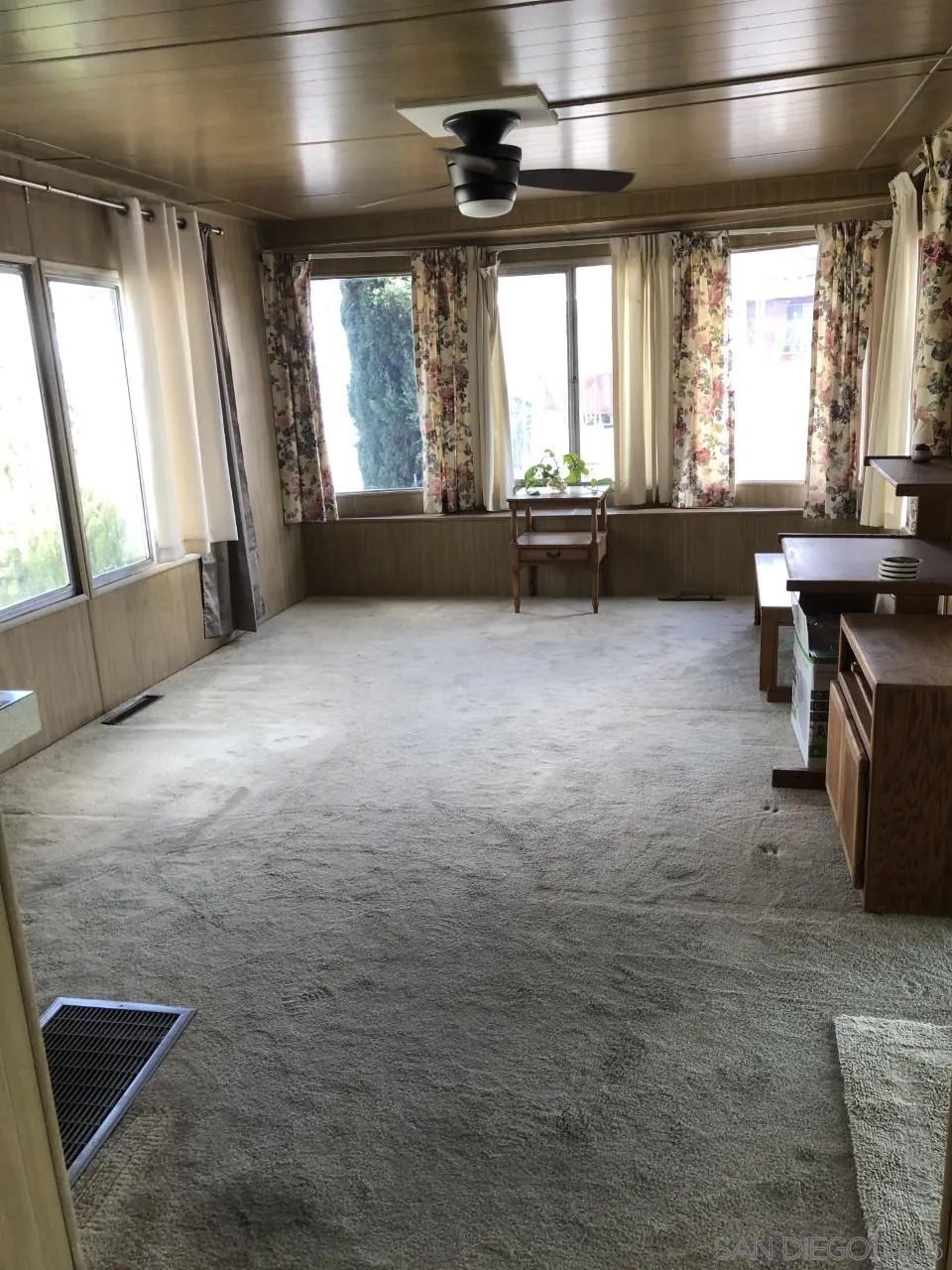 9459 Mission Gorge Road, Unit 18 Santee, CA 92071 - Photo 11 of 13 a view of livingroom with furniture and windows
