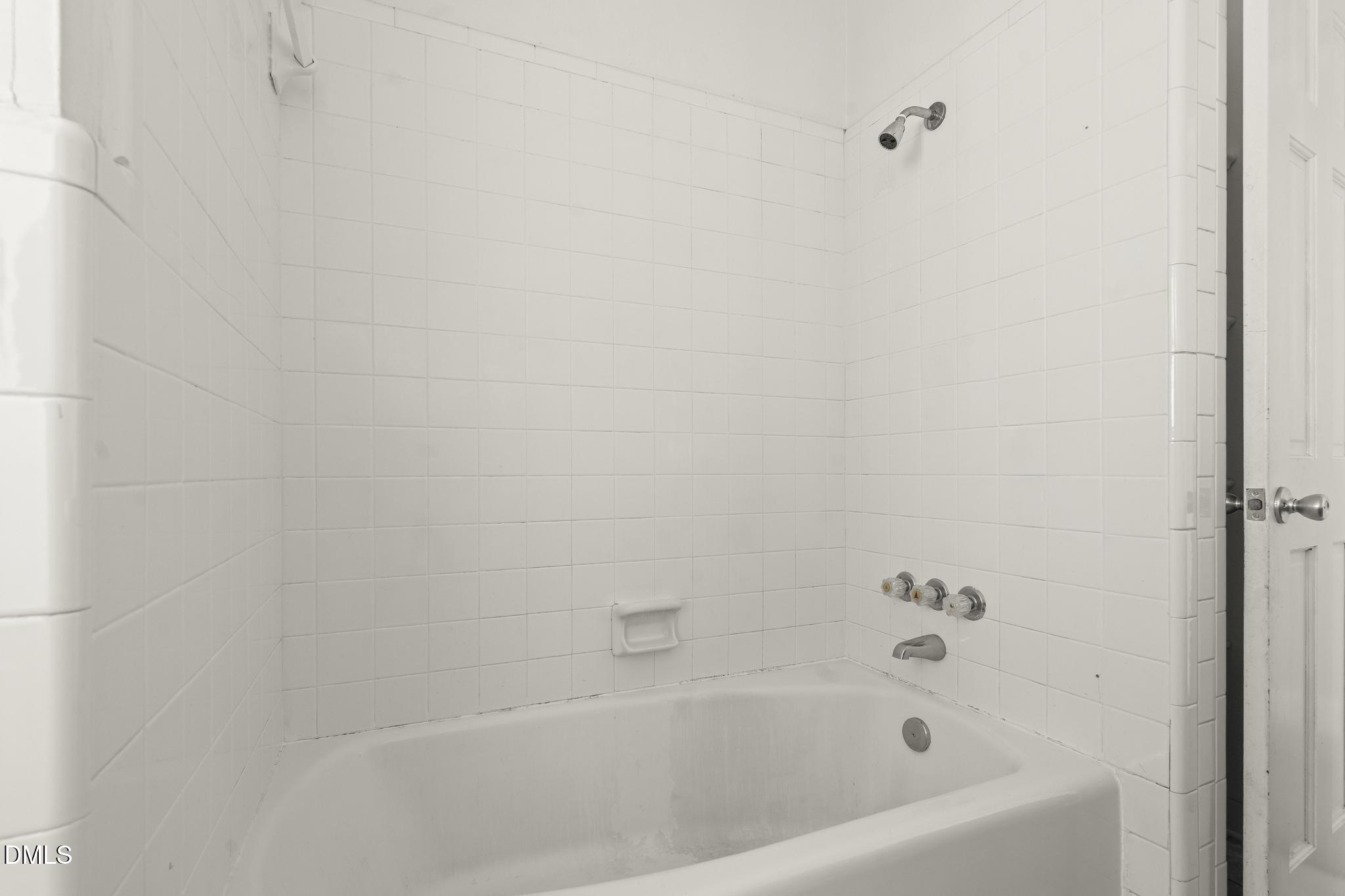 2400 Carbonton Road Sanford, NC 27330 - Photo 17 of 26 a bathroom with a bathtub