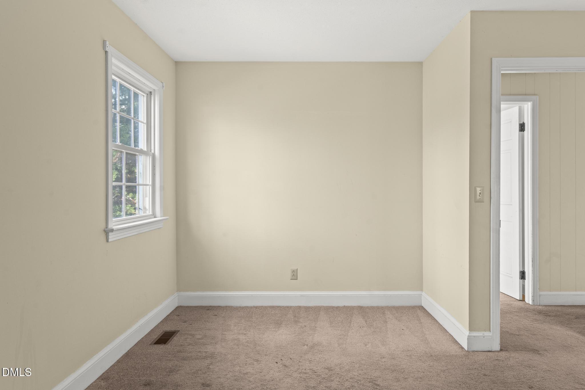 2400 Carbonton Road Sanford, NC 27330 - Photo 23 of 26 a view of an empty room with closet and a window