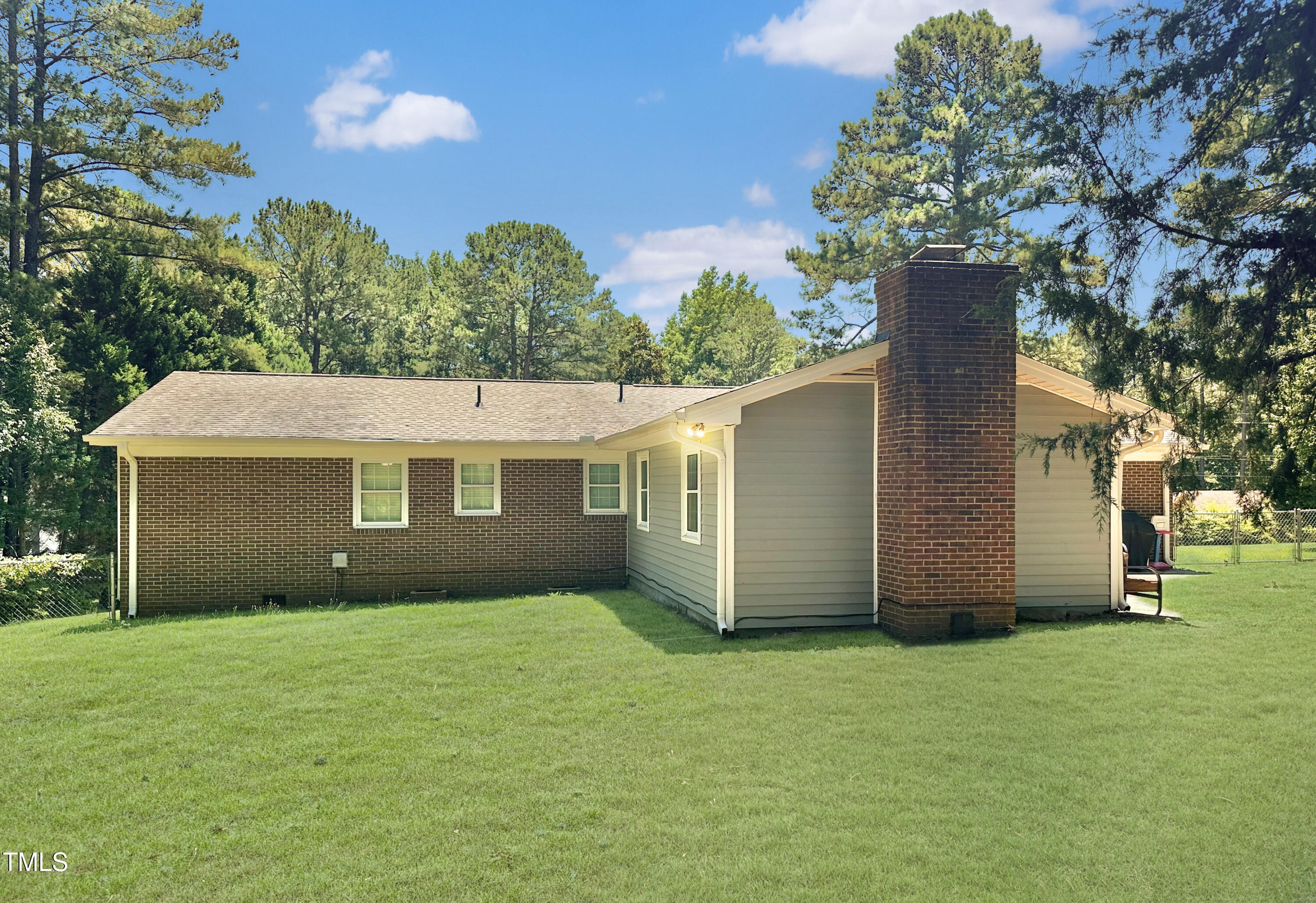 2400 Carbonton Road Sanford, NC 27330 - Photo 4 of 26 front view of a house with a yard