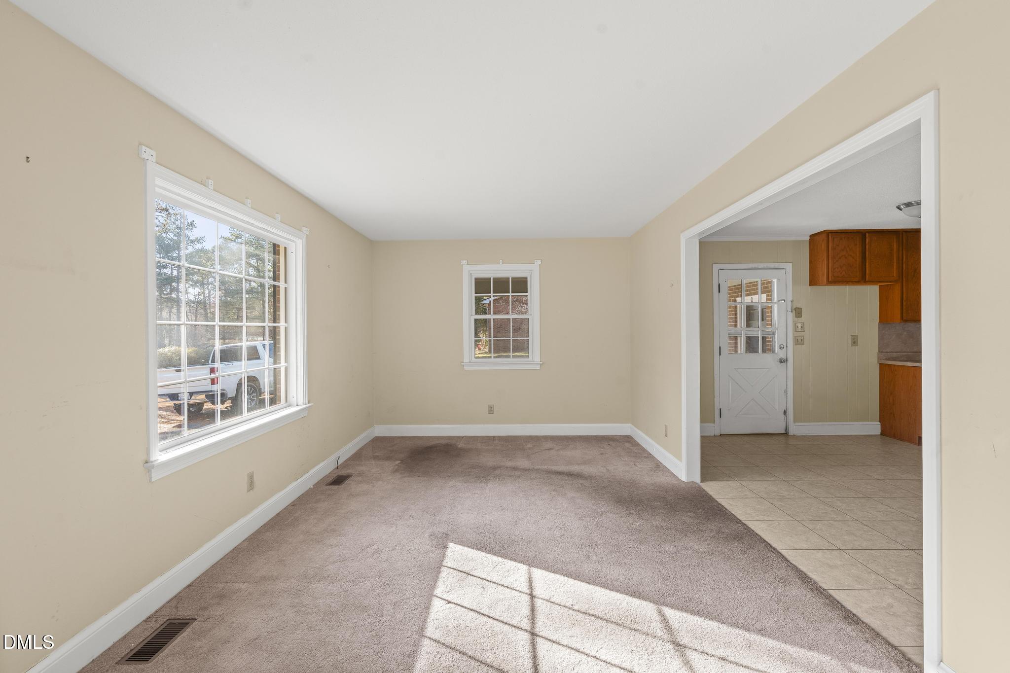 2400 Carbonton Road Sanford, NC 27330 - Photo 6 of 26 an empty room with windows