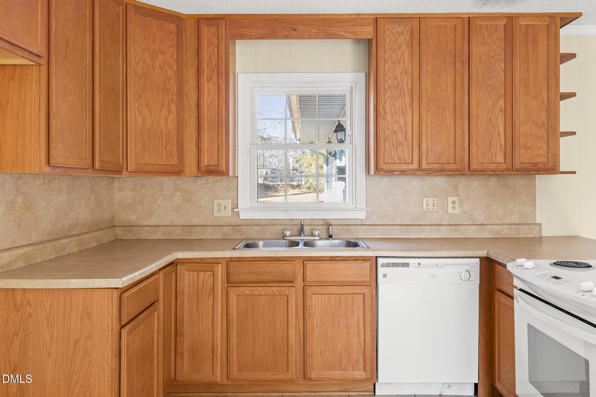 2400 Carbonton Road Sanford, NC 27330 - Photo 8 of 26 a view of a kitchen with sink and cabinets