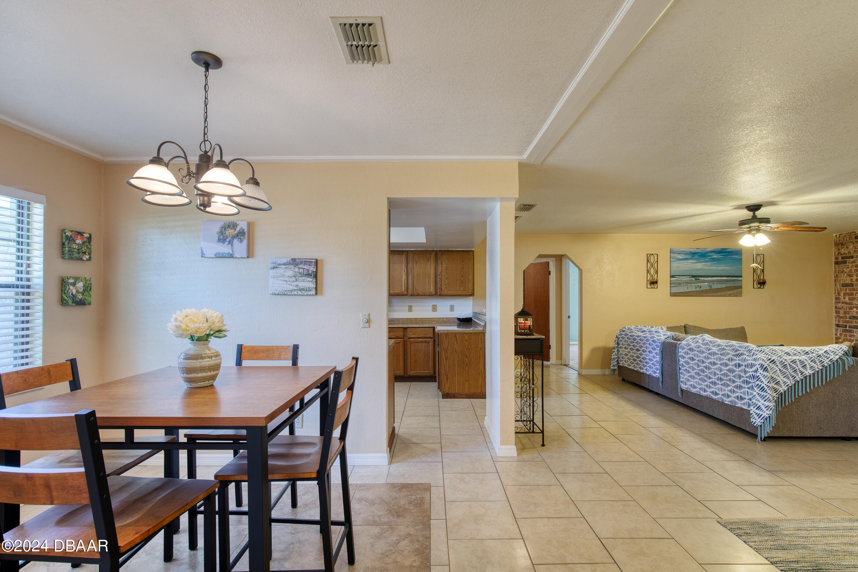 2304 Yule Tree Drive Edgewater, FL 32141 - Photo 12 of 34 a dining room with furniture and window