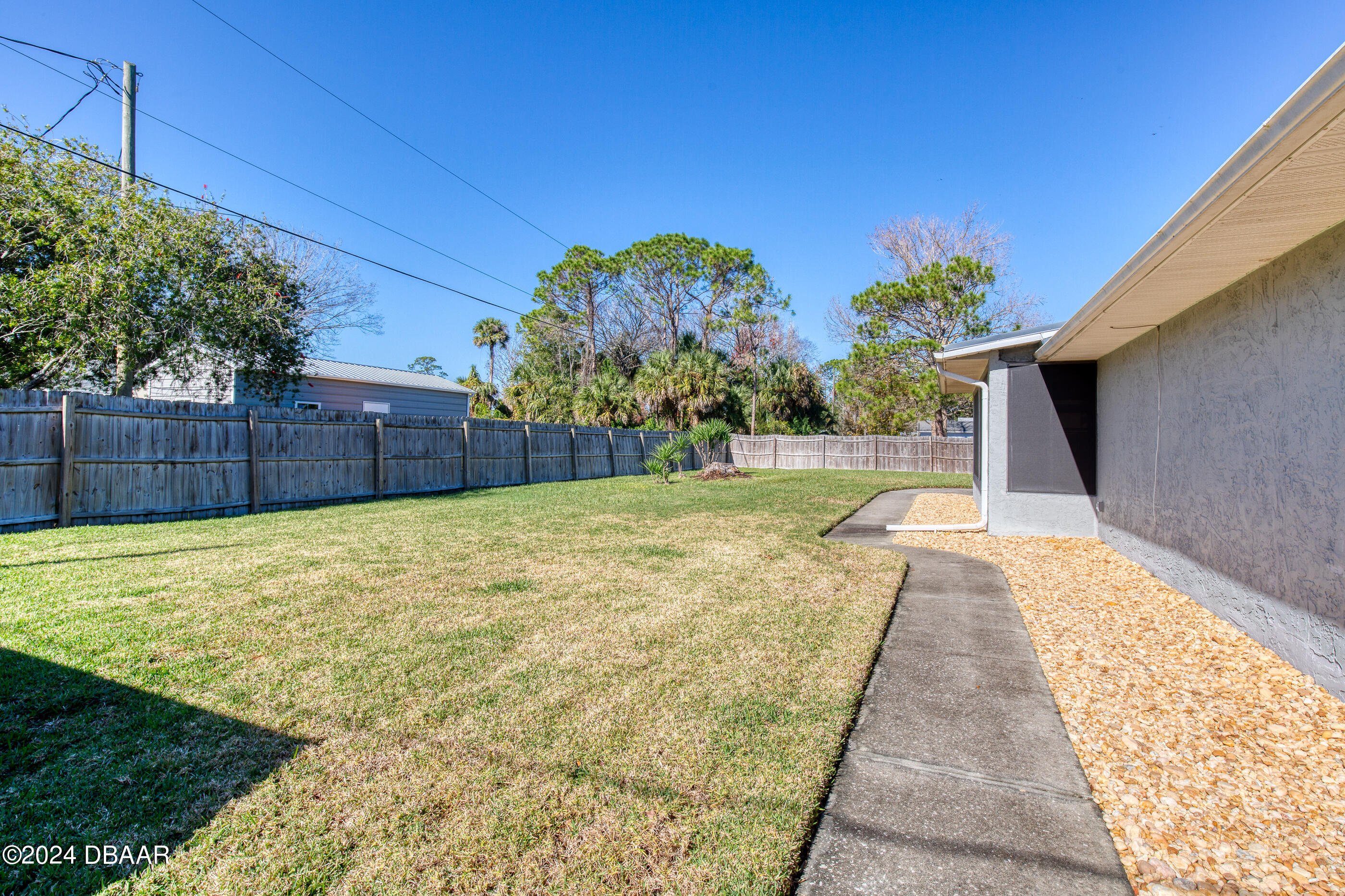 2304 Yule Tree Drive Edgewater, FL 32141 - Photo 31 of 34 a view of a backyard