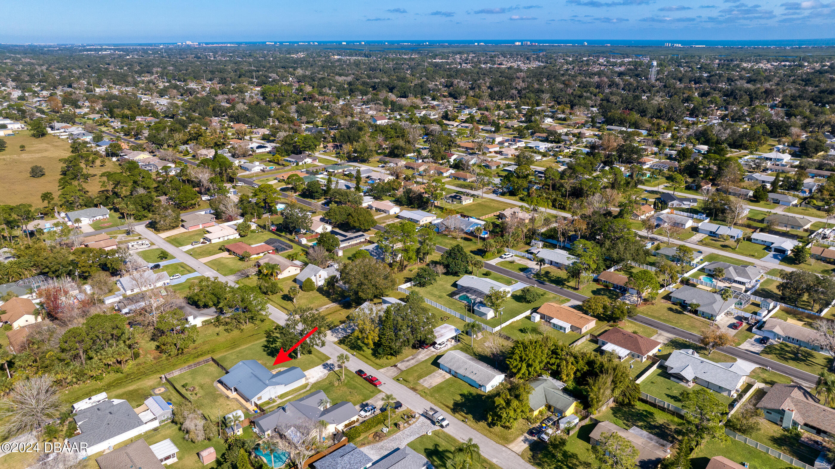 2304 Yule Tree Drive Edgewater, FL 32141 - Photo 4 of 34 an aerial view of a city