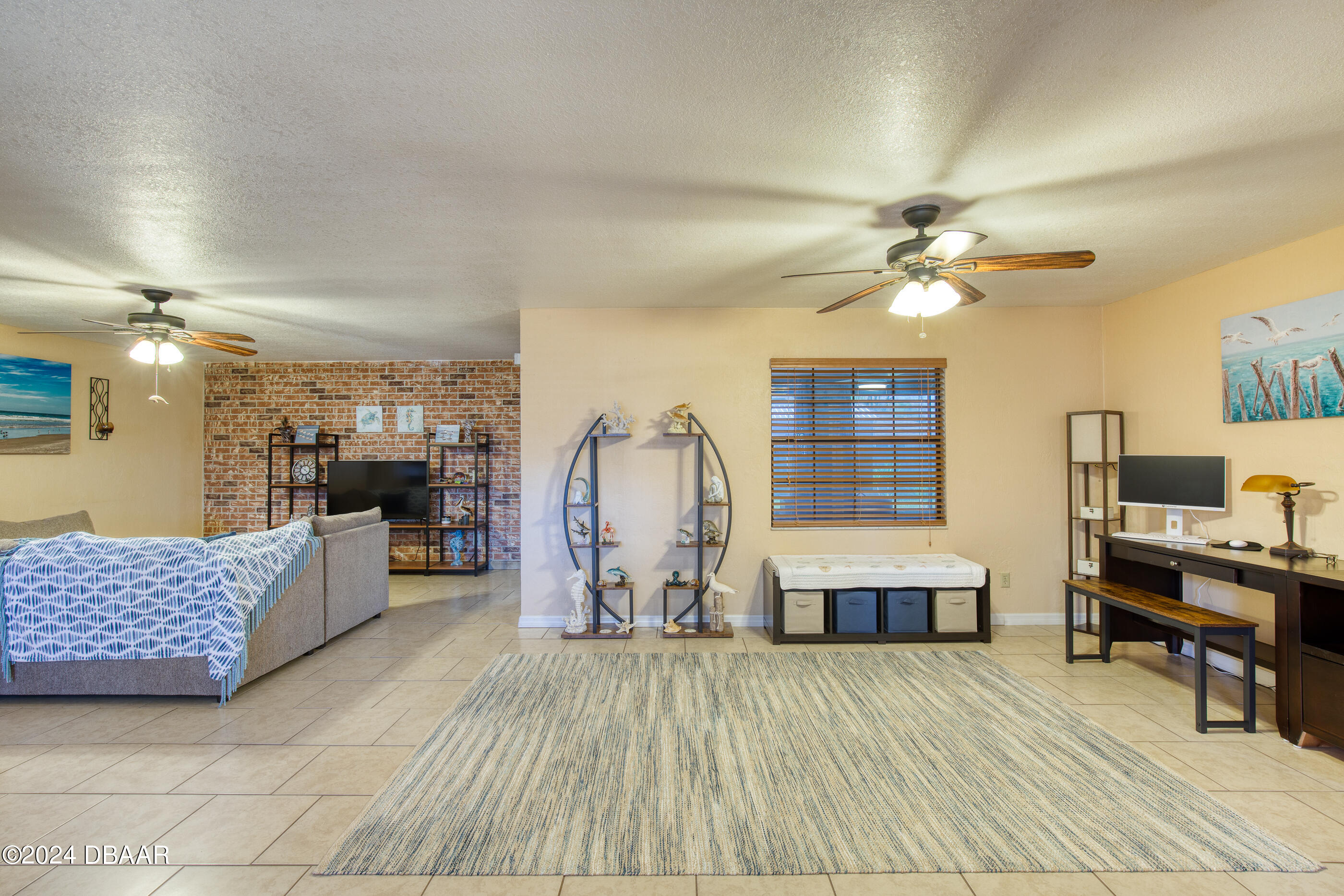 2304 Yule Tree Drive Edgewater, FL 32141 - Photo 9 of 34 a living room with furniture and wooden floor