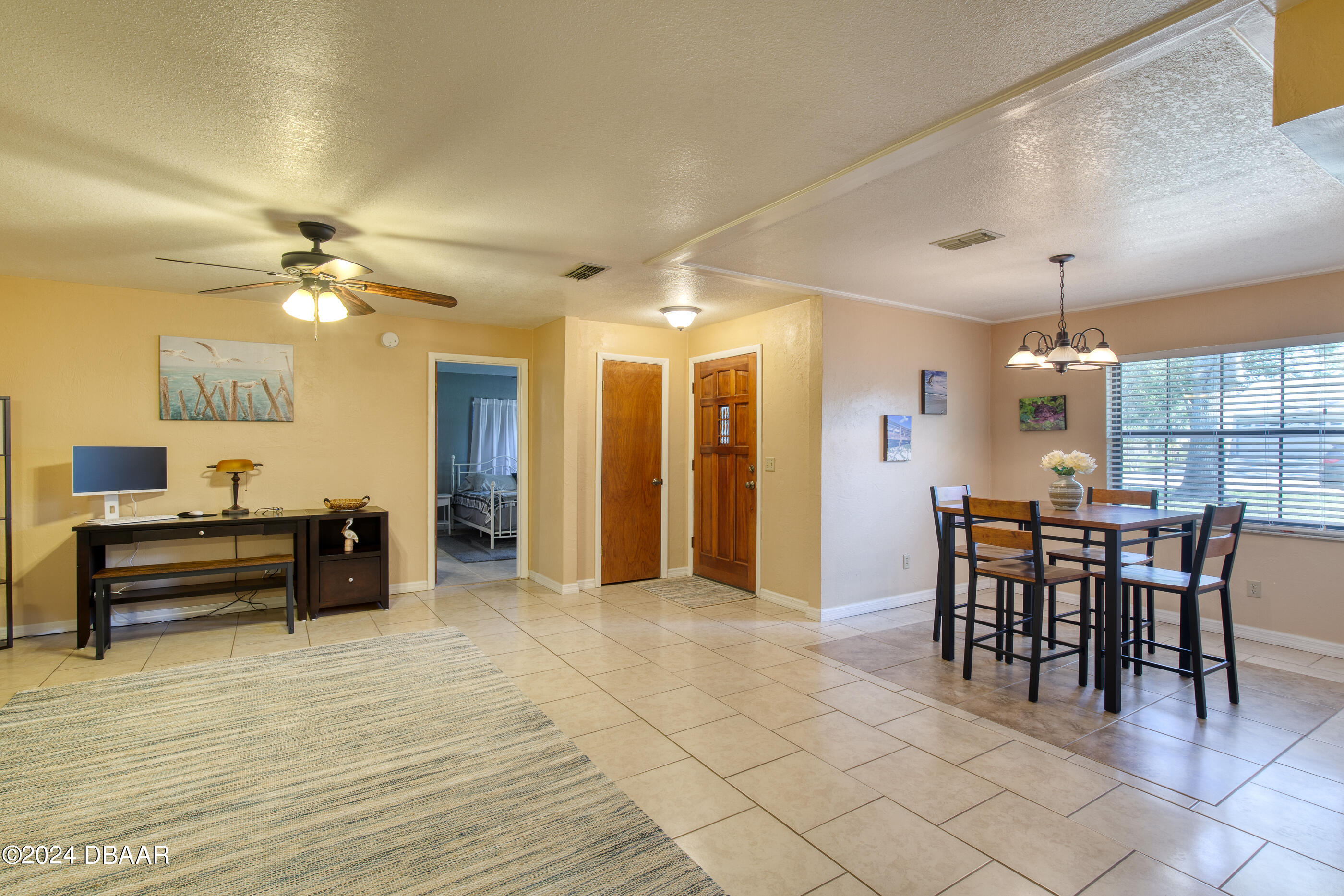 2304 Yule Tree Drive Edgewater, FL 32141 - Photo 10 of 34 a view of a dining room with furniture