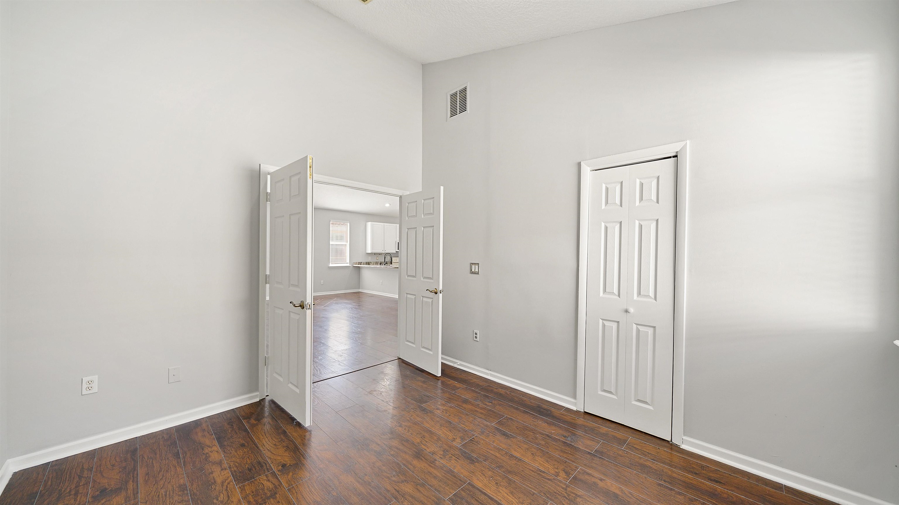 778 Copperhead Circle St. Augustine, FL 32092 - Photo 19 of 35 a view of empty room with wooden floor