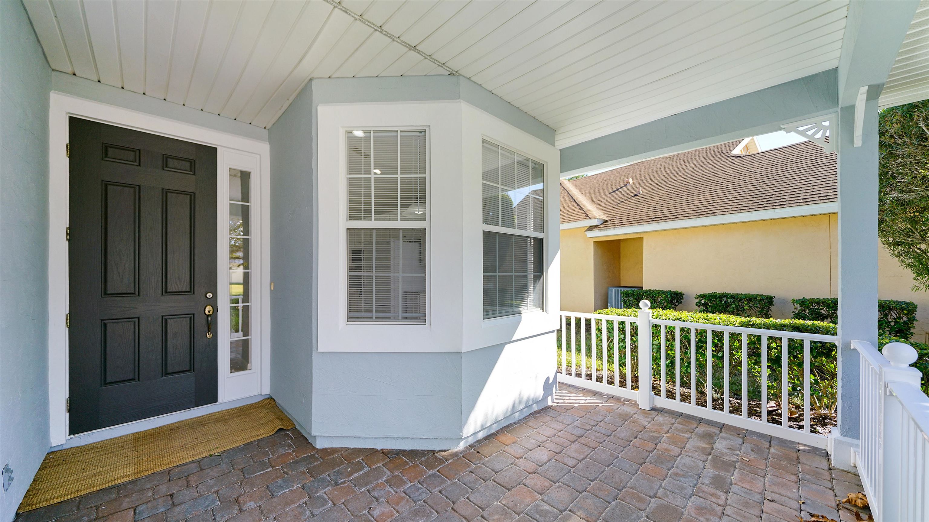 778 Copperhead Circle St. Augustine, FL 32092 - Photo 3 of 35 a view of a house with a porch