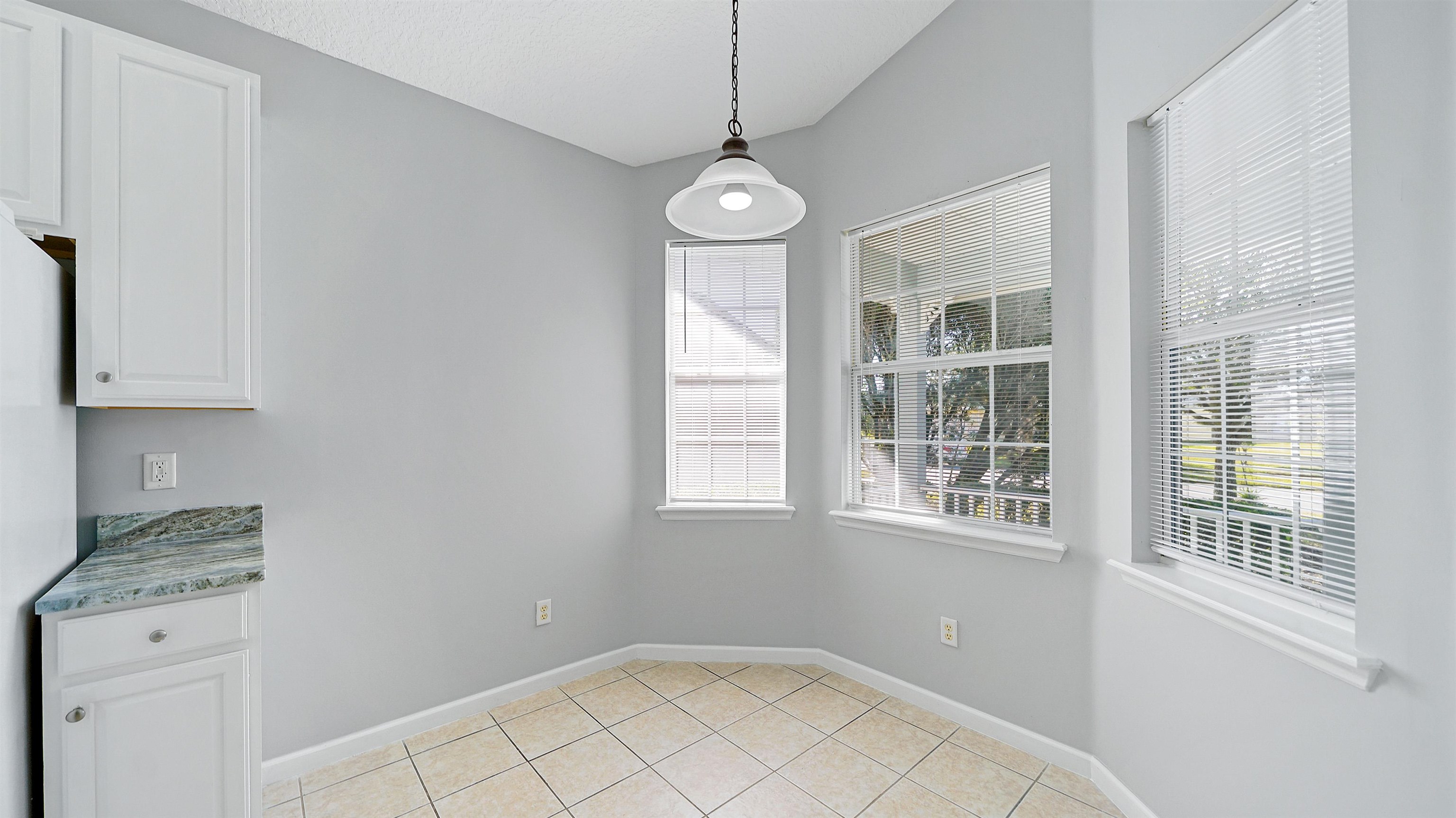 778 Copperhead Circle St. Augustine, FL 32092 - Photo 9 of 35 a view of an empty room with a window