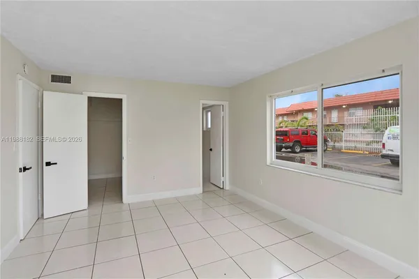 a view of an empty room with window