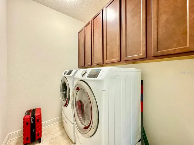 a view of a livingroom with a ceiling fan and window
