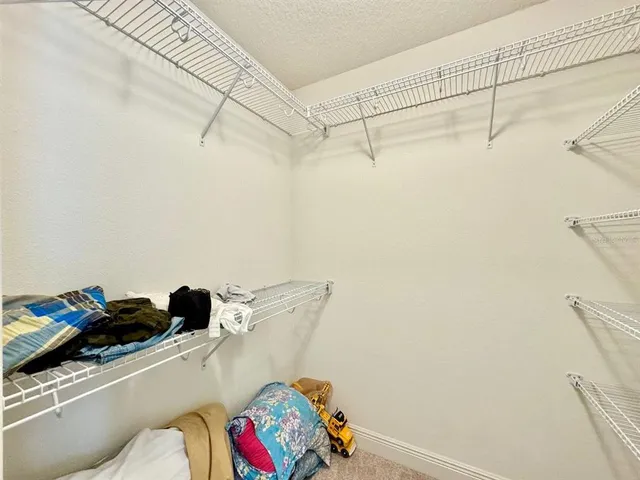 a bathroom with a tub and shower