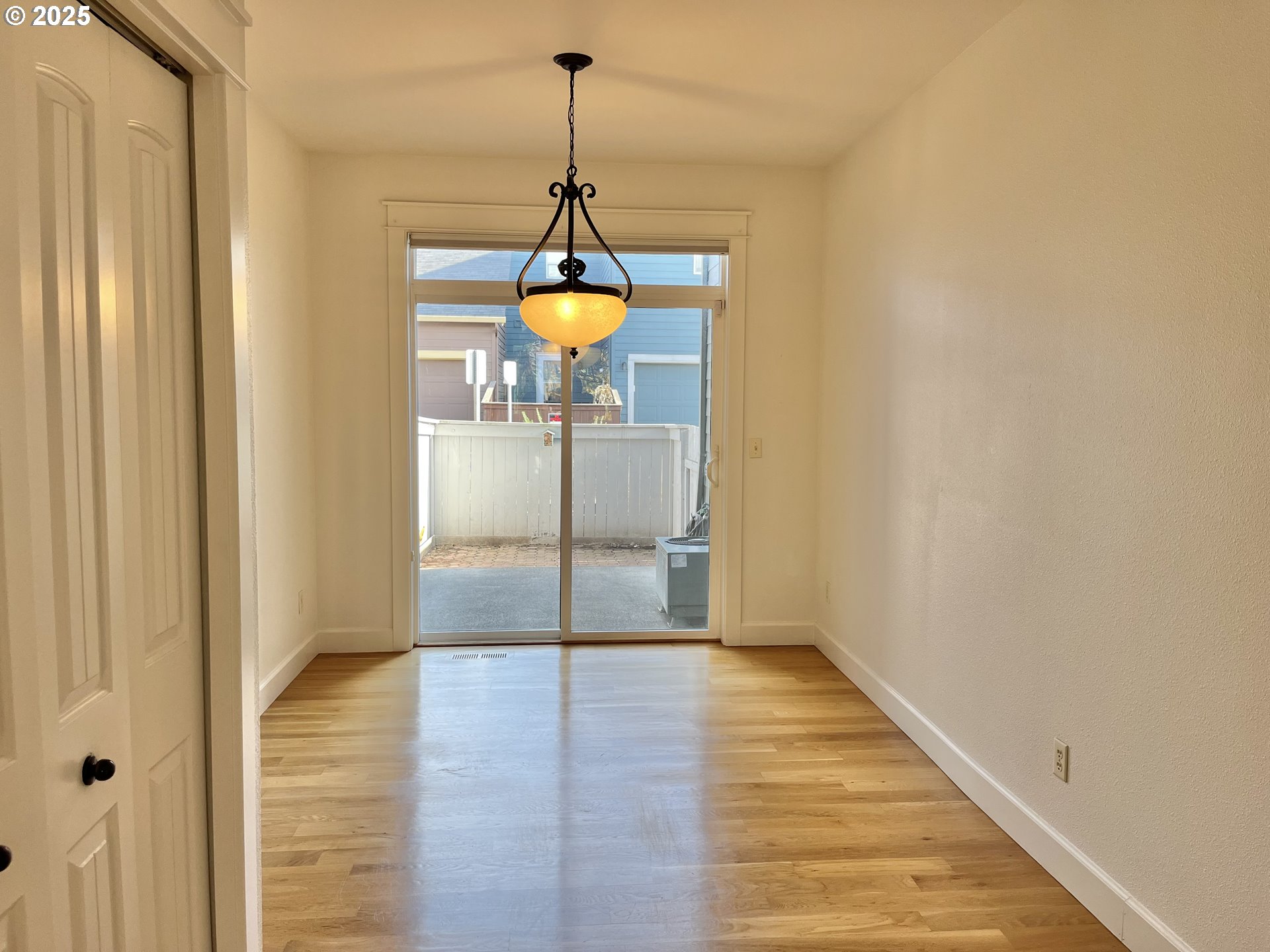 3535 Southeast 197th Avenue Camas, WA 98607 - Photo 11 of 24 a view of a hallway with a chandelier