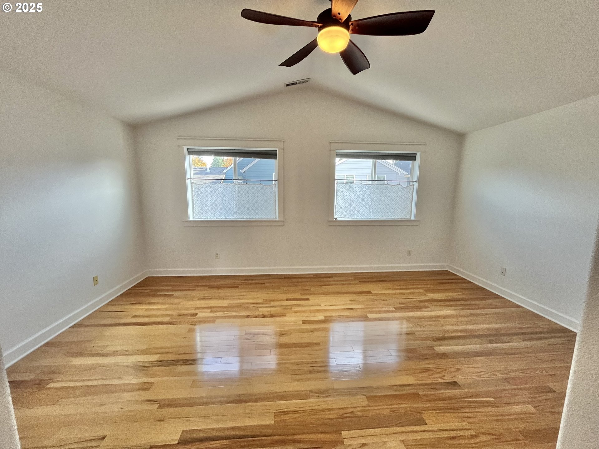 3535 Southeast 197th Avenue Camas, WA 98607 - Photo 17 of 24 a view of empty room with window and ceiling fan