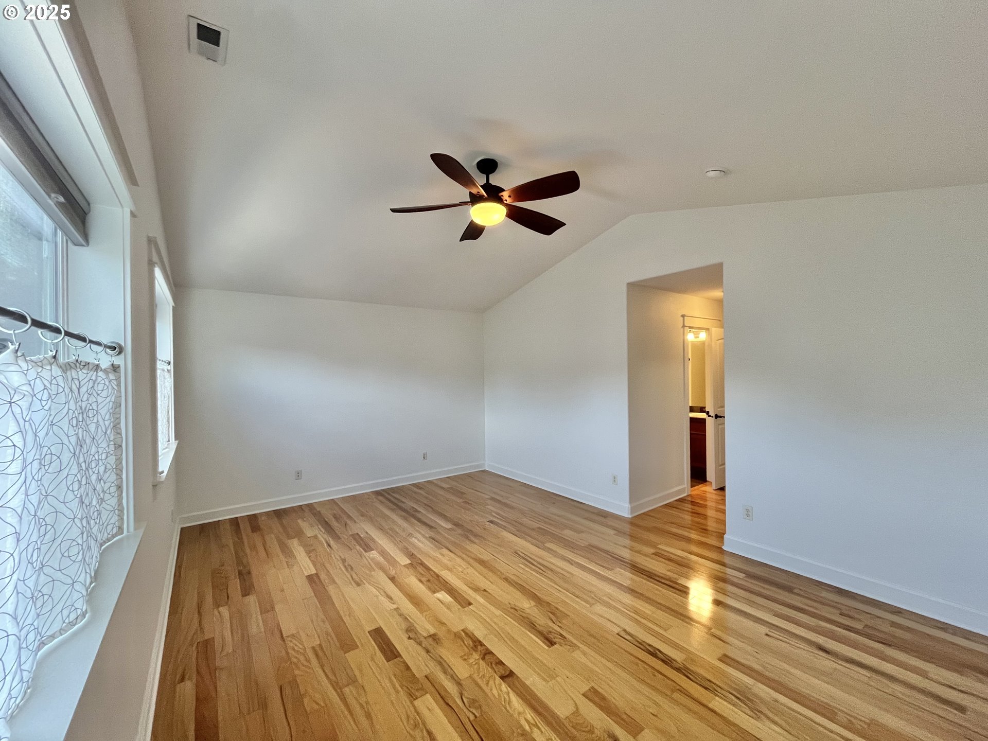 3535 Southeast 197th Avenue Camas, WA 98607 - Photo 20 of 24 wooden floor in an empty room with a window