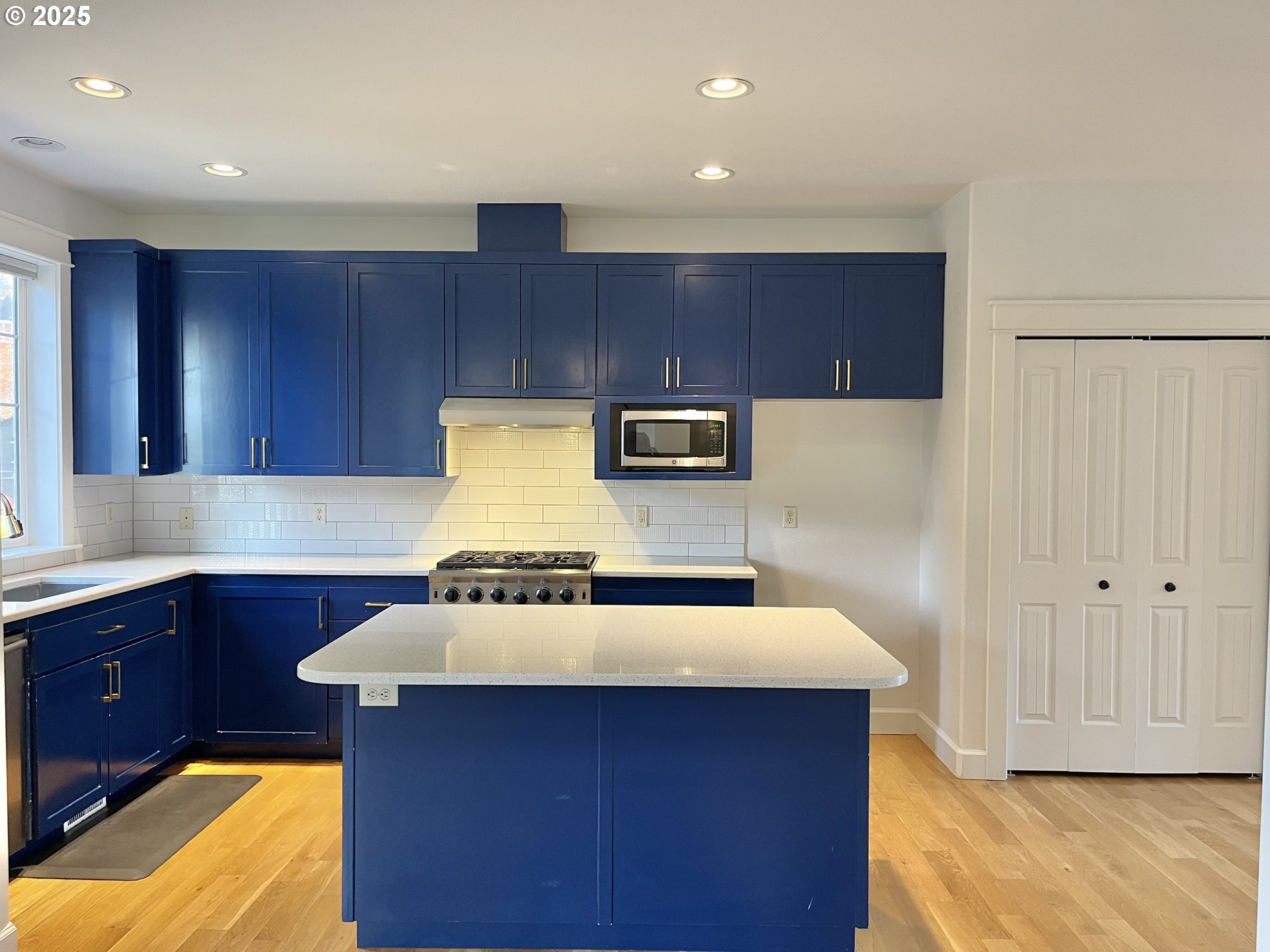 3535 Southeast 197th Avenue Camas, WA 98607 - Photo 5 of 24 a kitchen with a sink cabinets and wooden floor