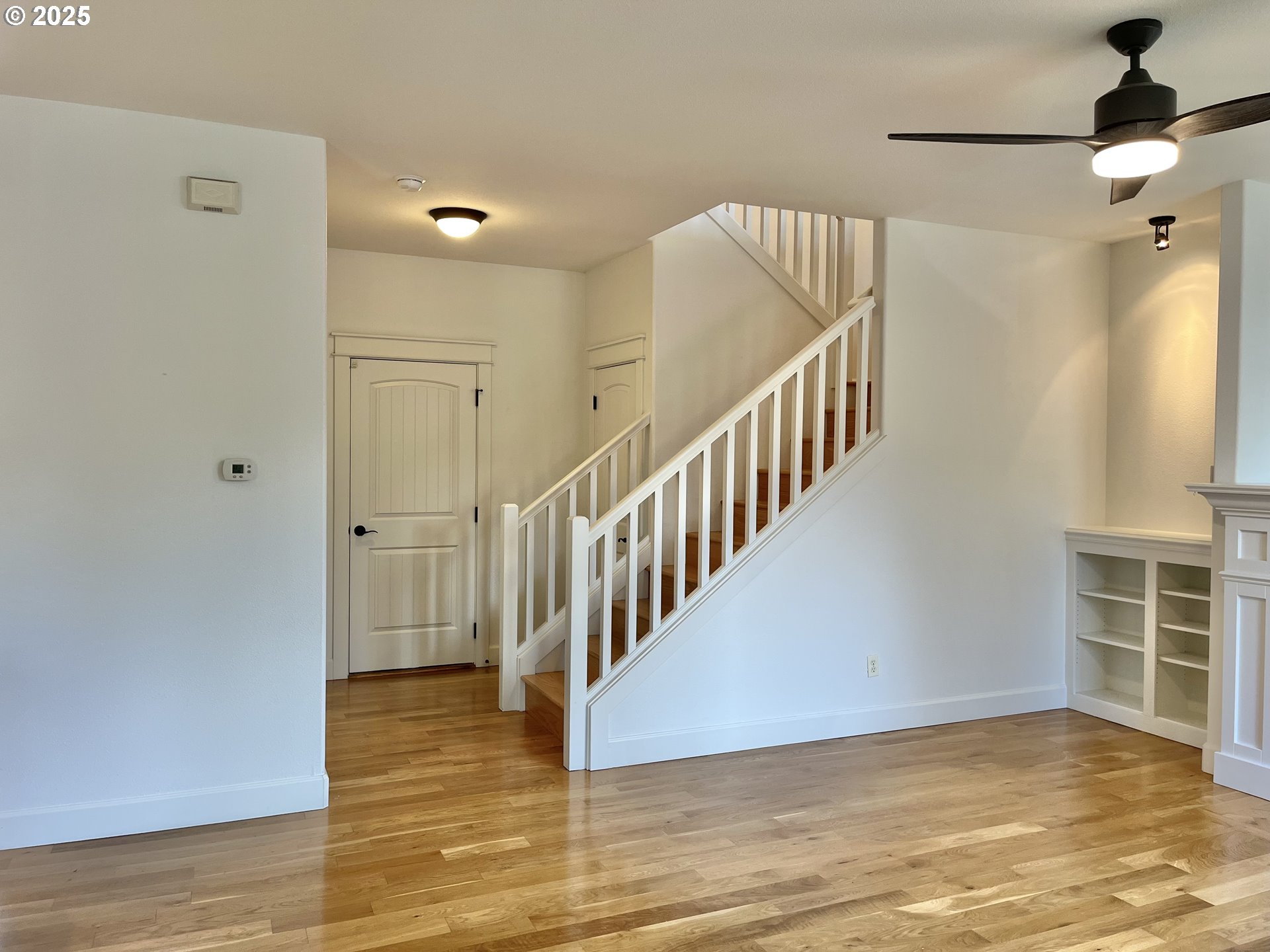 3535 Southeast 197th Avenue Camas, WA 98607 - Photo 10 of 24 a view of an empty room with wooden floor and a window