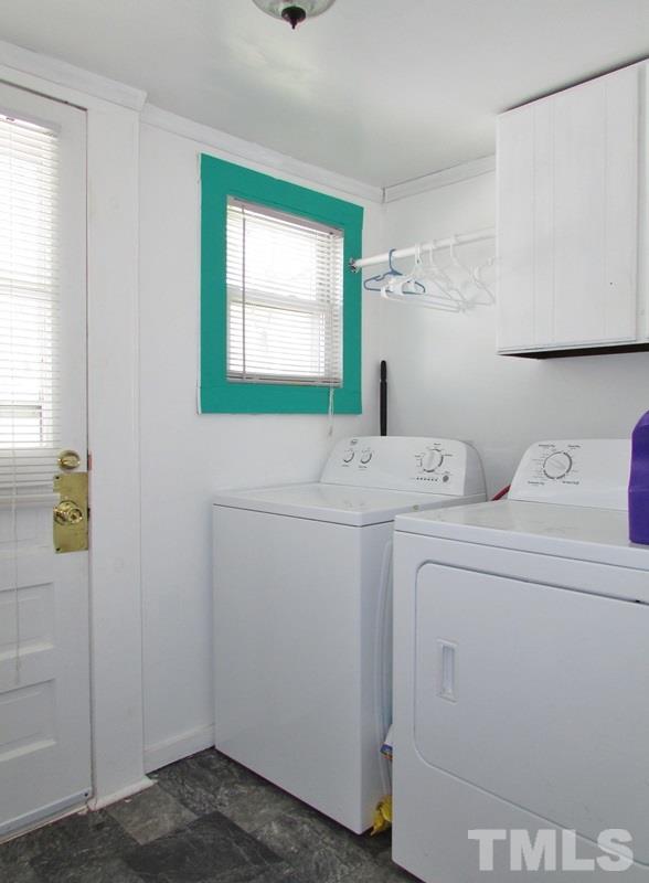 212 Cavel Chub Lake Road Roxboro, NC 27574 - Photo 12 of 18 From the side entry door you step right into the laundry room.