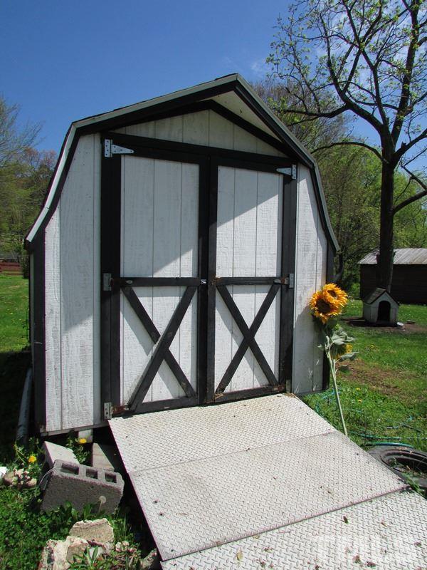 212 Cavel Chub Lake Road Roxboro, NC 27574 - Photo 16 of 18 Storage for the lawn mower or other equipment