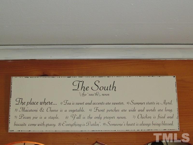212 Cavel Chub Lake Road Roxboro, NC 27574 - Photo 18 of 18 The sign kind of sums it all up in this sweet cottage....