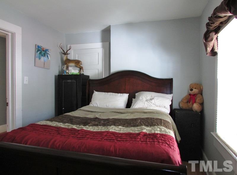 212 Cavel Chub Lake Road Roxboro, NC 27574 - Photo 9 of 18 Master bedroom has a walk in closet