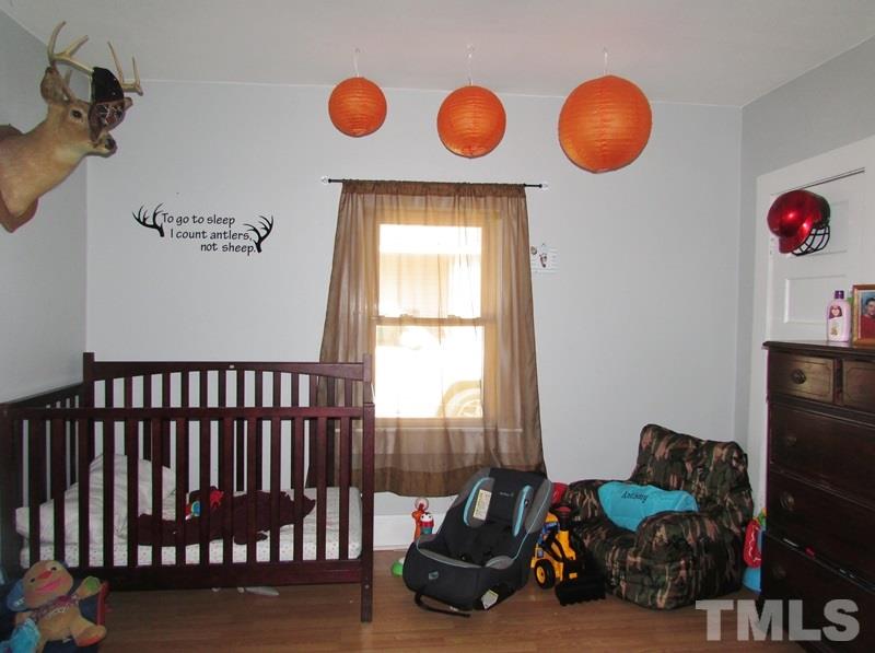212 Cavel Chub Lake Road Roxboro, NC 27574 - Photo 10 of 18 What a cute room for a child. If no children in the family you could use it as a office.