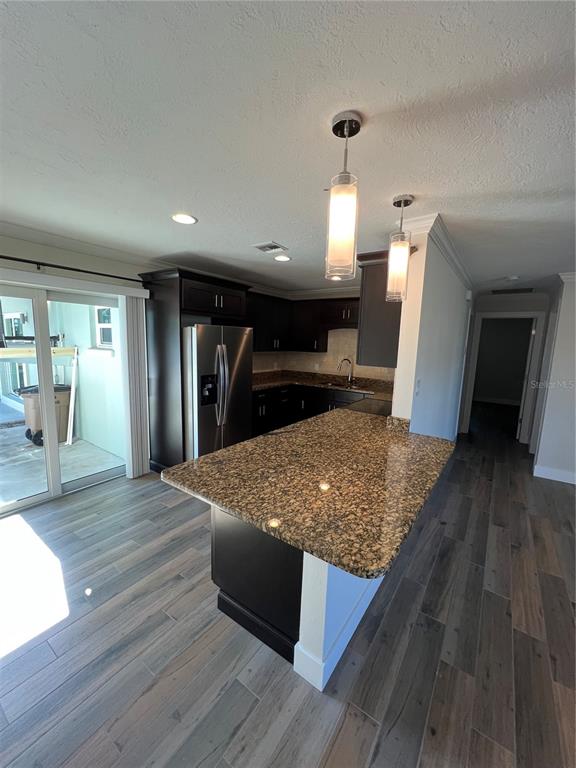 511 West Retta Esplanade Punta Gorda, FL 33950 - Photo 7 of 19 a view of kitchen and sink