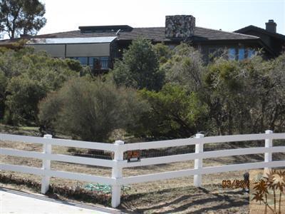 60533 Devils Ladder Road Mountain Center, CA 92561 - Photo 1 of 8 a view of a house with a window