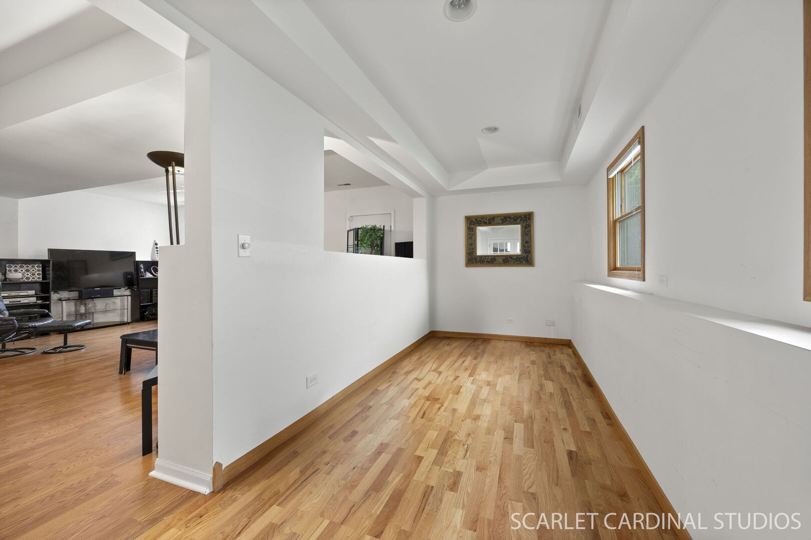 1004 Prairie View Court Naperville, IL 60563 - Photo 20 of 33 a view of livingroom with hardwood floor and a ceiling fan