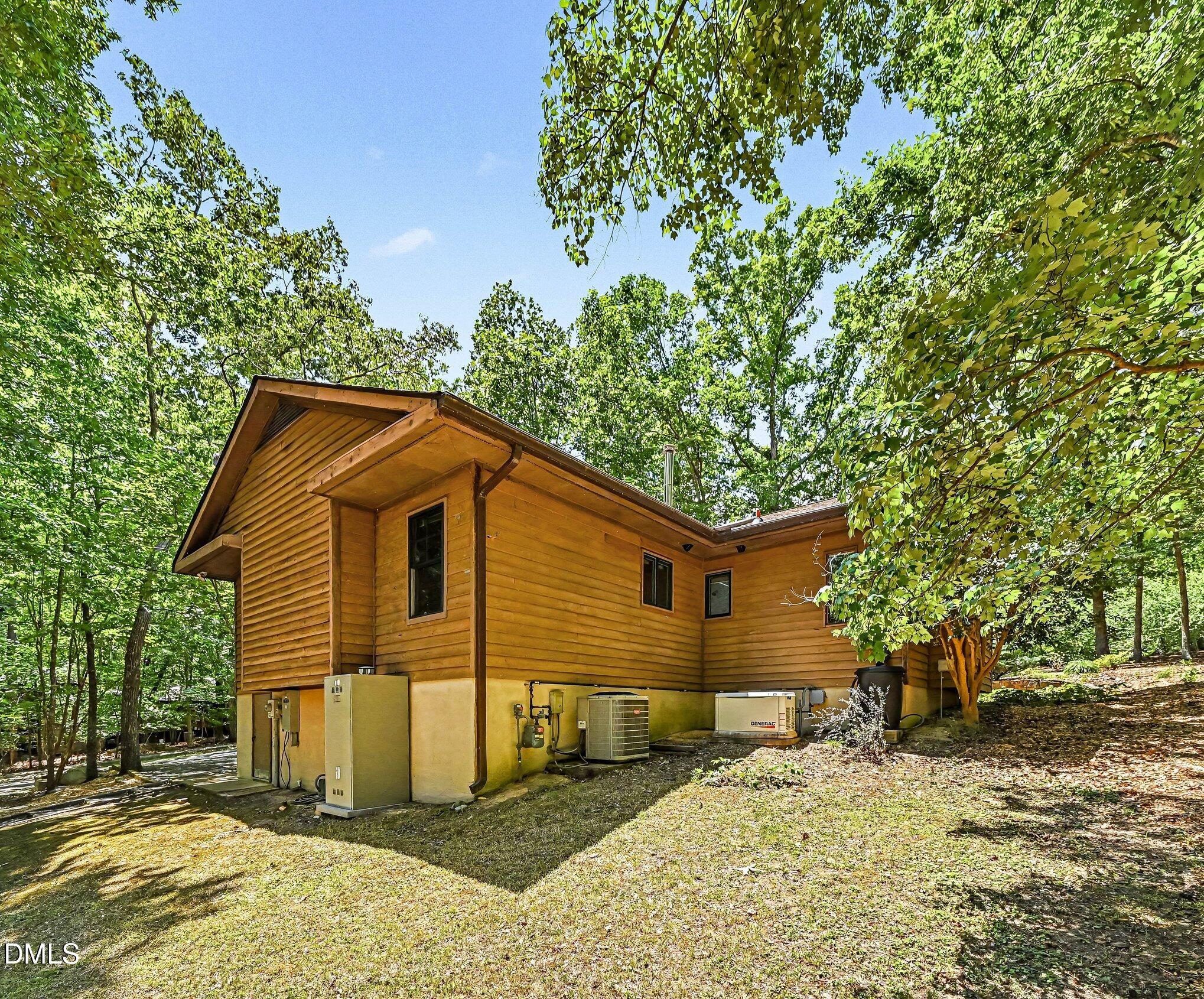 200 Spring Valley Road Carrboro, NC 27510 - Photo 31 of 38 a view of a house with a yard