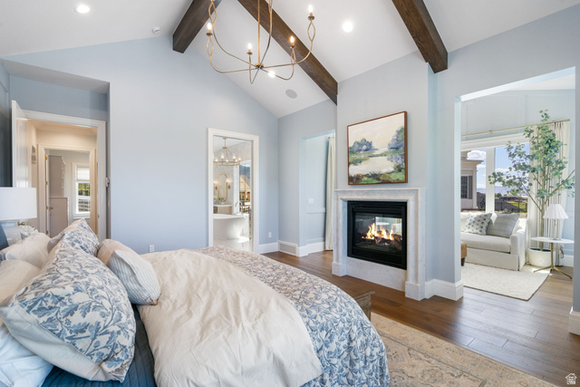 115 East Hidden Ridge Lane, Unit 42 Mapleton, UT 84664 - Photo 21 of 103 Vaulted ceiling featuring exposed wood beams and a chandelier