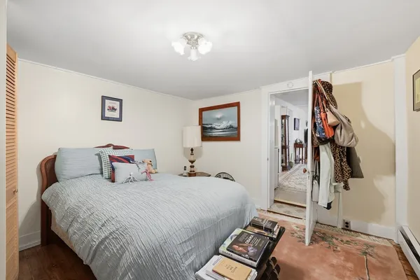 a bed room with a bed and a window