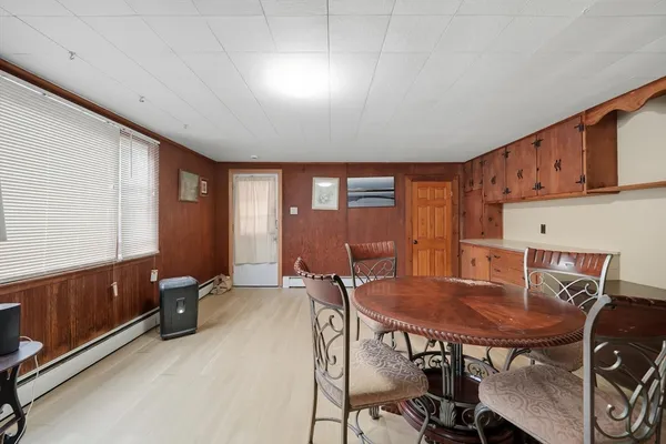 a workspace with furniture and window