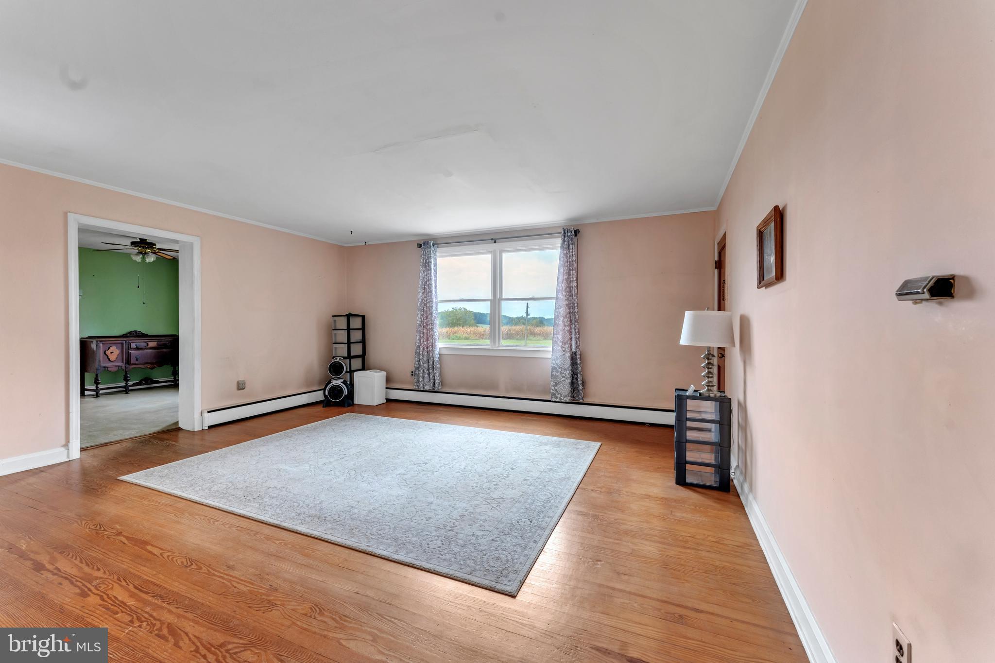 18225 Gunpowder Road Hampstead, MD 21074 - Photo 16 of 30 a view of a room with window and hardwood floor
