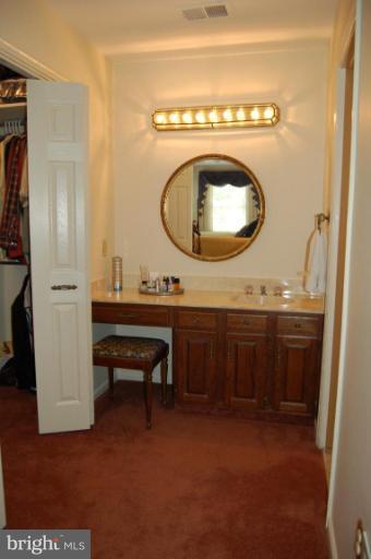 3112 Russell Road Alexandria, VA 22305 - Photo 23 of 30 Master dressing vanity and awlkin closet