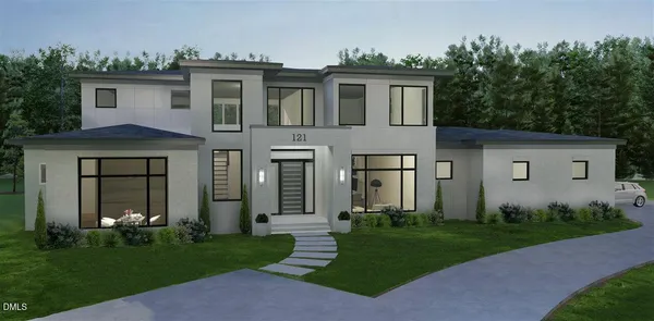 a front view of a house with a garden and plants