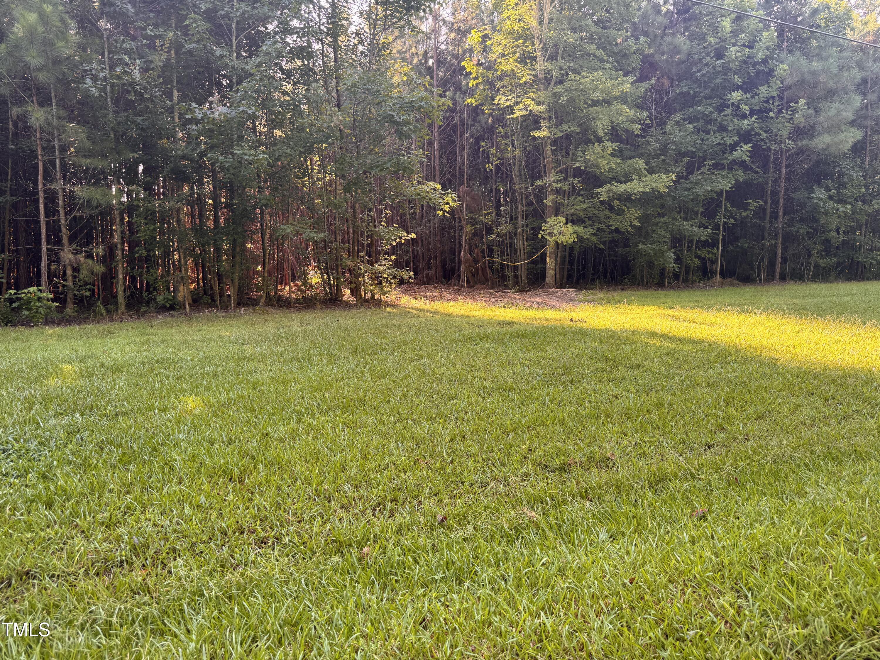 586 Poythress Road Chapel Hill, NC 27516 - Photo 14 of 33 a view of swimming pool with an outdoor space and seating area