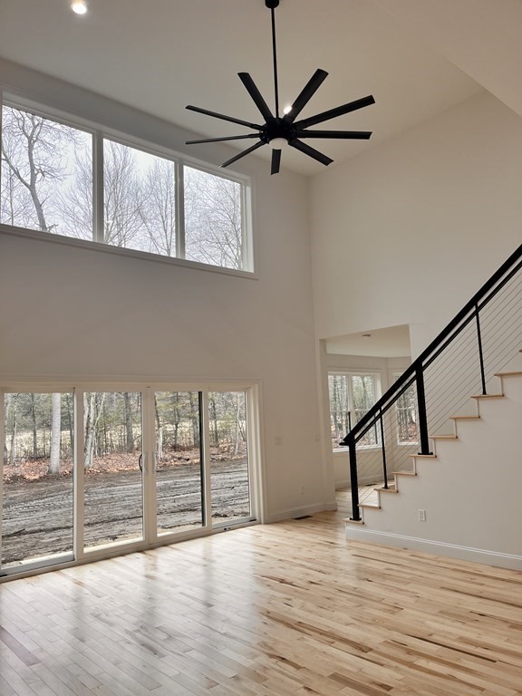119 Linden Ridge Road Amherst, MA 01002 - Photo 5 of 5 a view of an empty room with wooden floor and a window