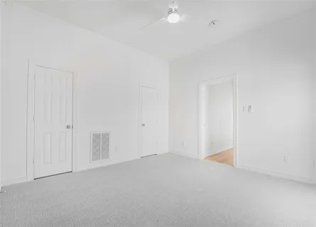 a view of a bench in the backyard