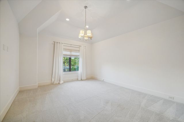 a bathroom with a granite countertop sink a mirror and a shower