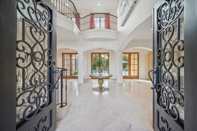 a view of an entryway with a front door