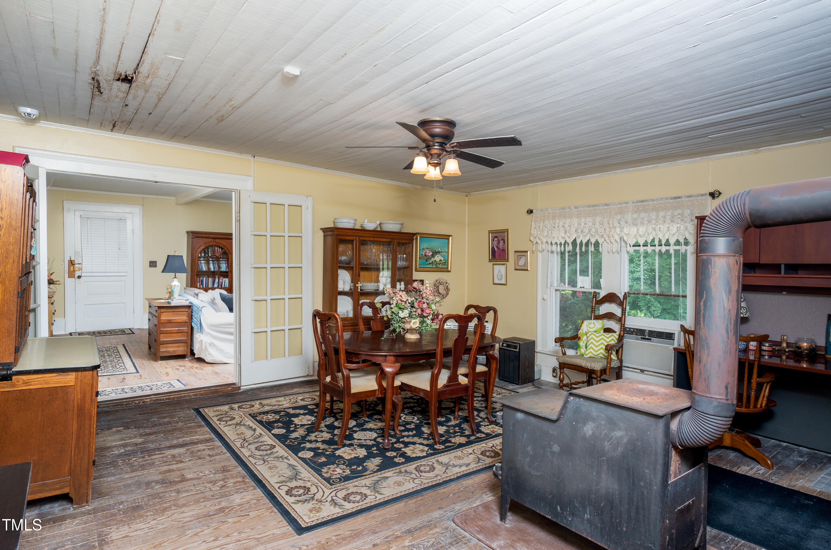 7167 Adolph Road Bailey, NC 27807 - Photo 11 of 18 a living room with furniture and a chandelier