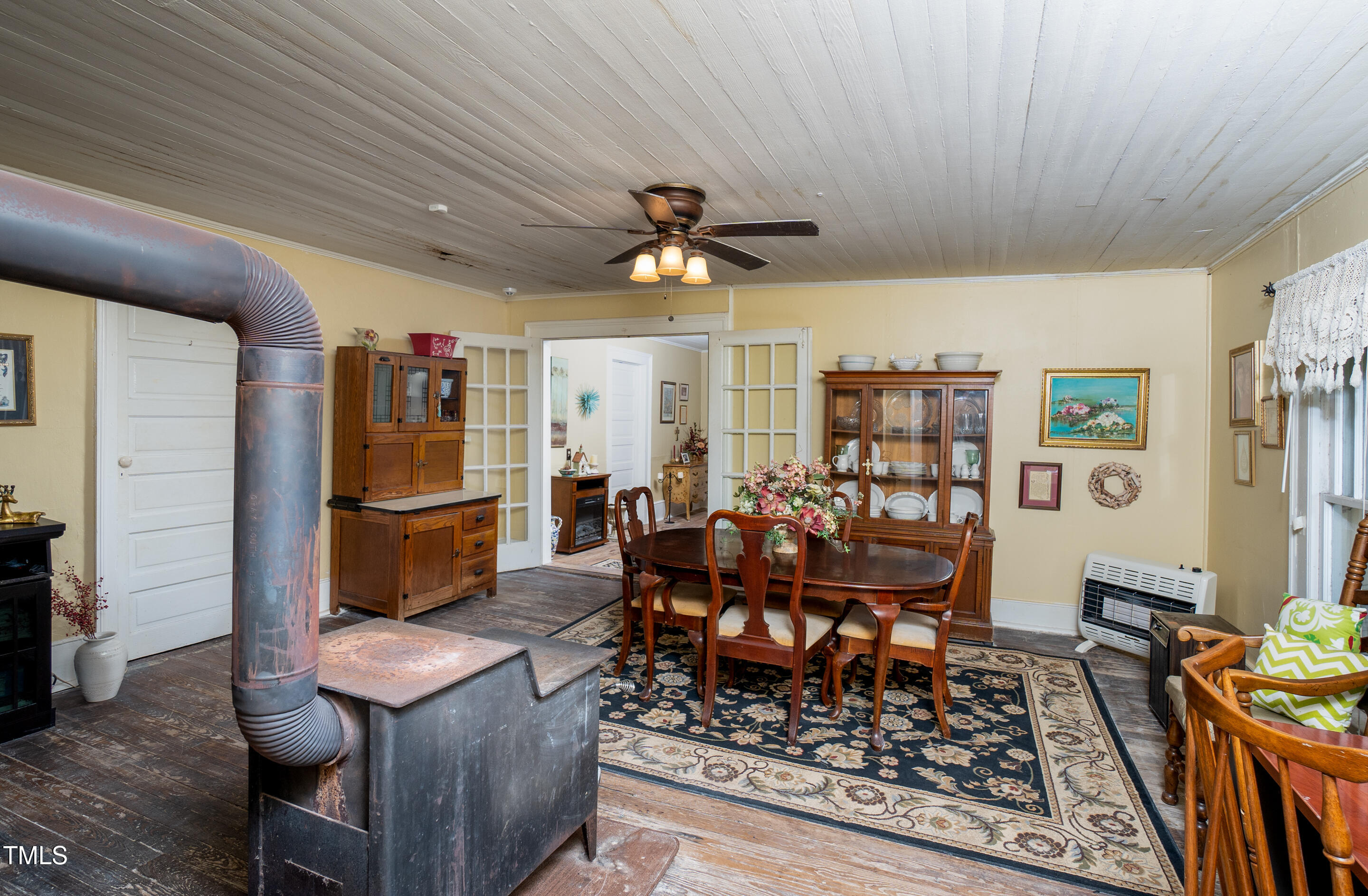 7167 Adolph Road Bailey, NC 27807 - Photo 14 of 18 a living room with lots of furniture and a rug