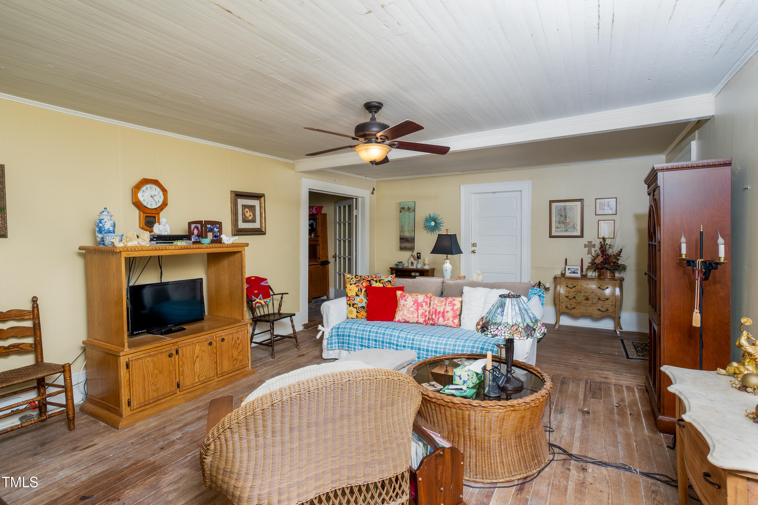 7167 Adolph Road Bailey, NC 27807 - Photo 9 of 18 a living room with furniture and a flat screen tv