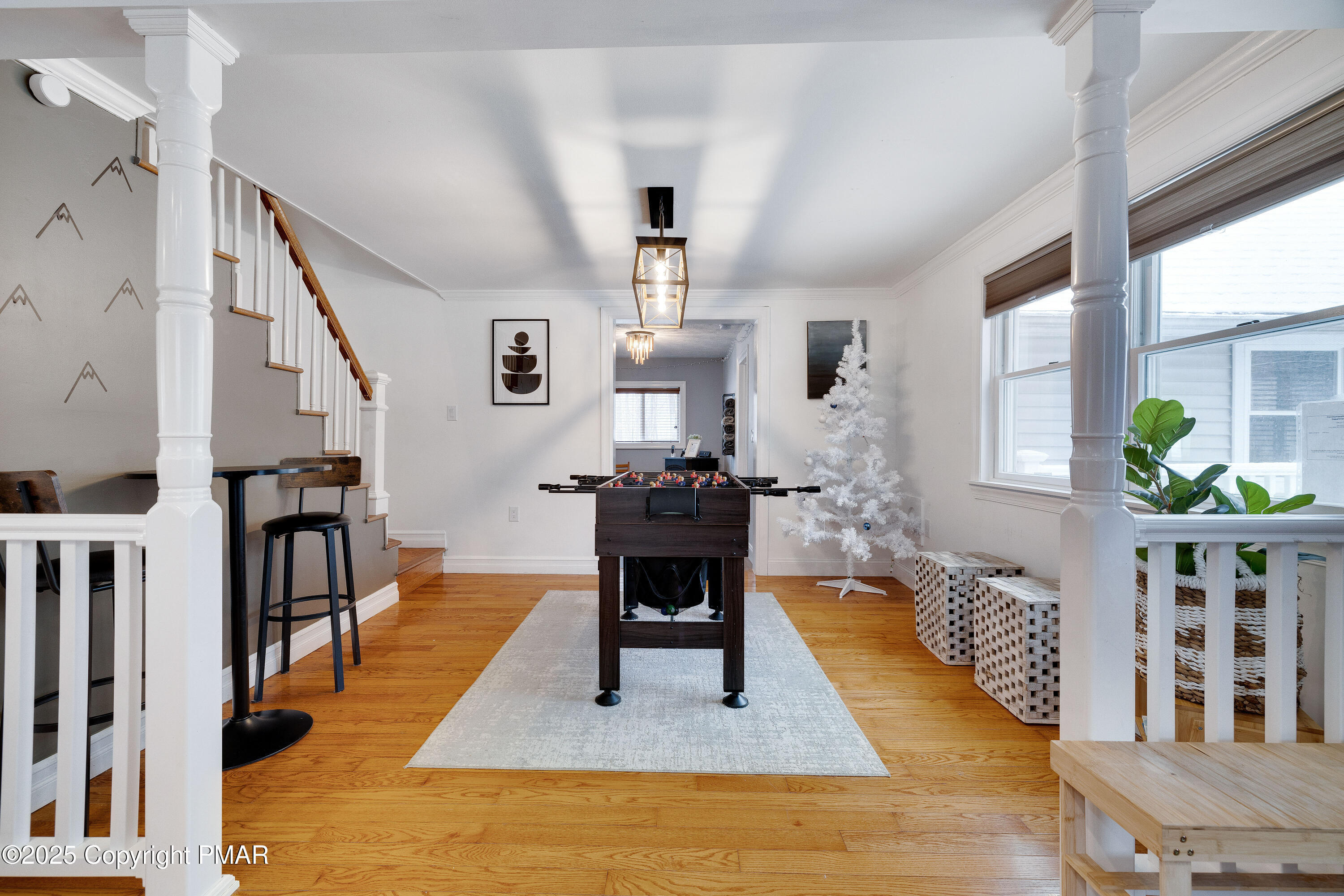 3137 Fern Road Pocono Summit, PA 18346 - Photo 16 of 51 a living room with fireplace furniture and a wooden floor