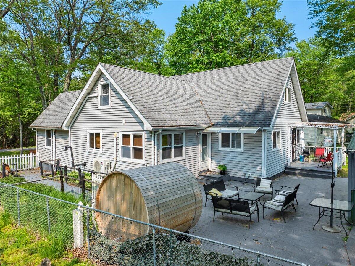 3137 Fern Road Pocono Summit, PA 18346 - Photo 2 of 51 a view of a house with backyard