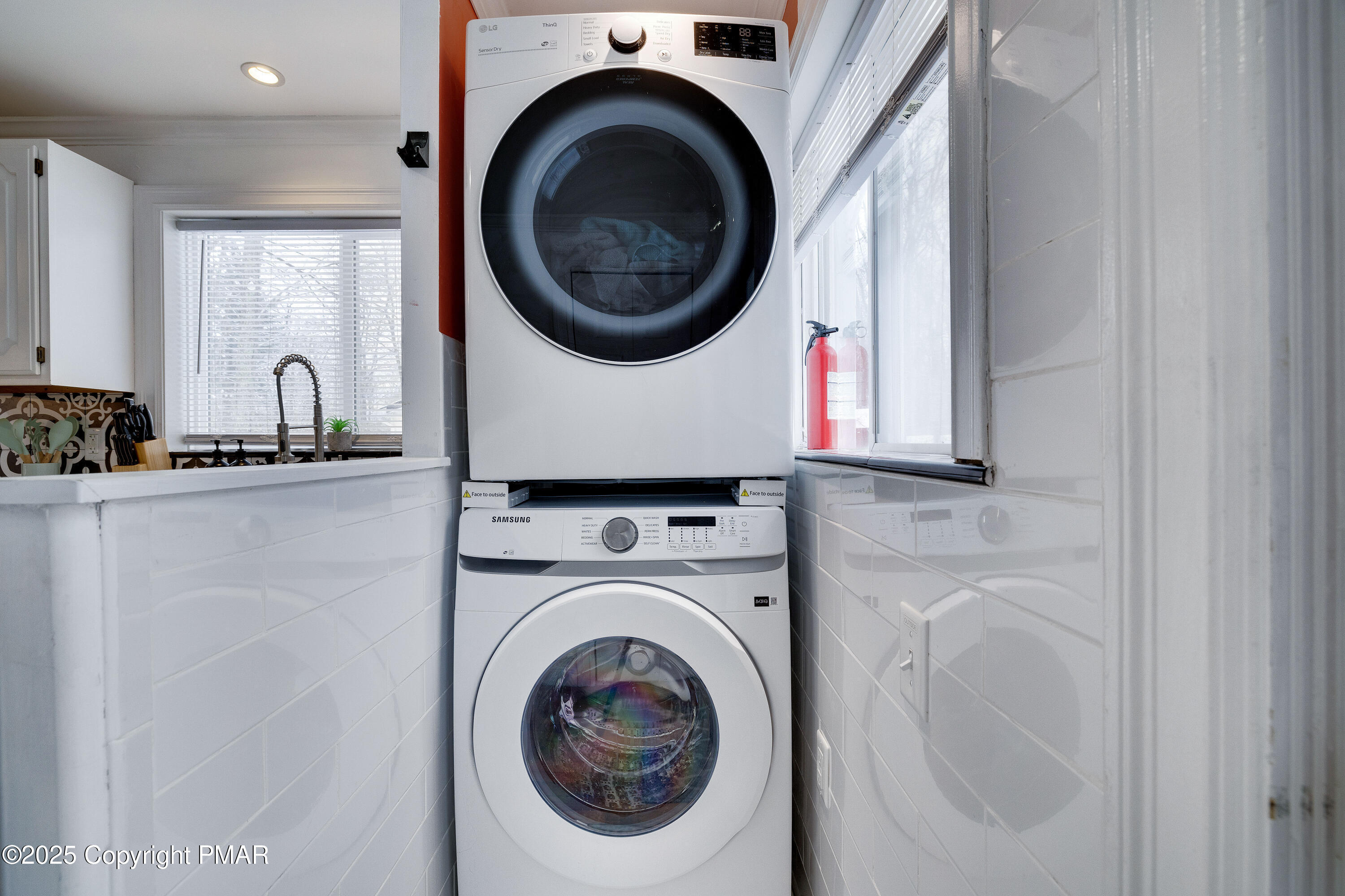 3137 Fern Road Pocono Summit, PA 18346 - Photo 32 of 51 a utility room with dryer and washer